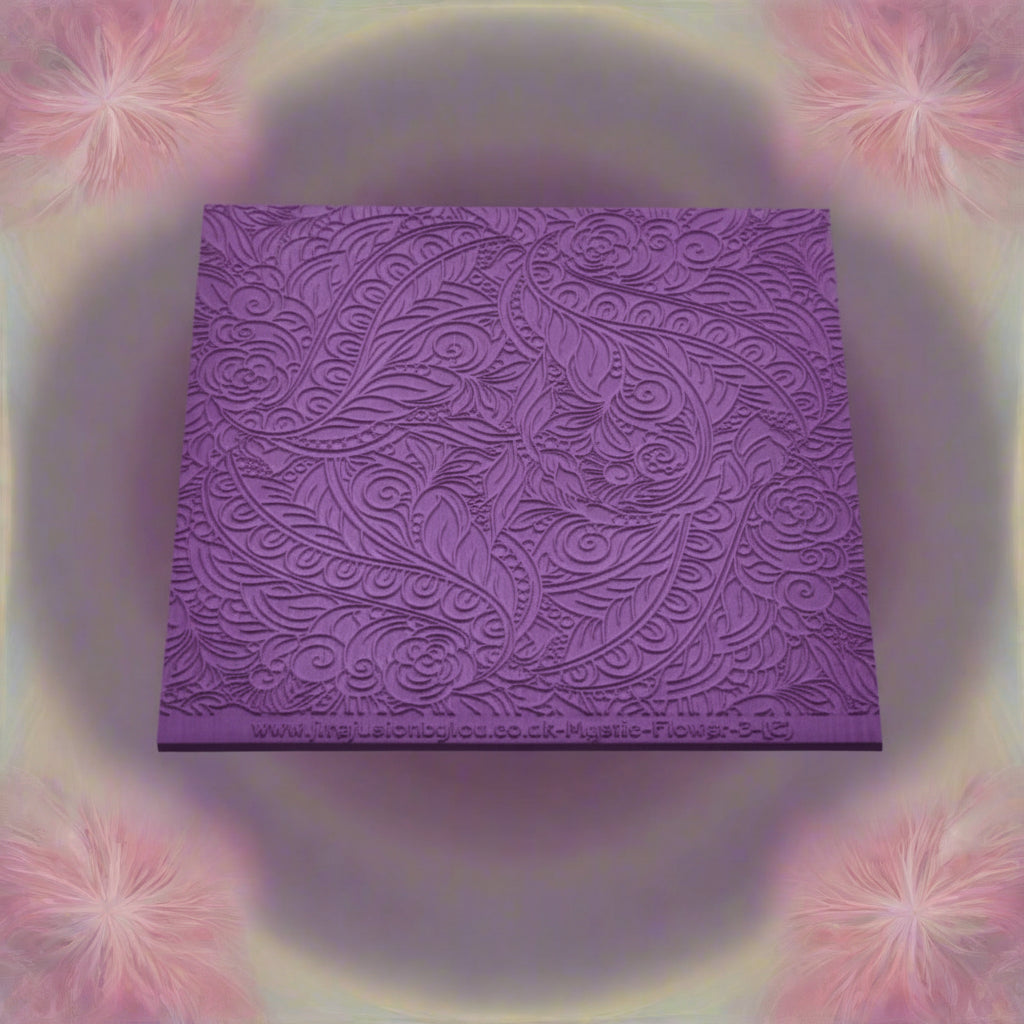 embossed Flowery mandala style texture mat. Use to make an impression on metal clay and polymer clay.