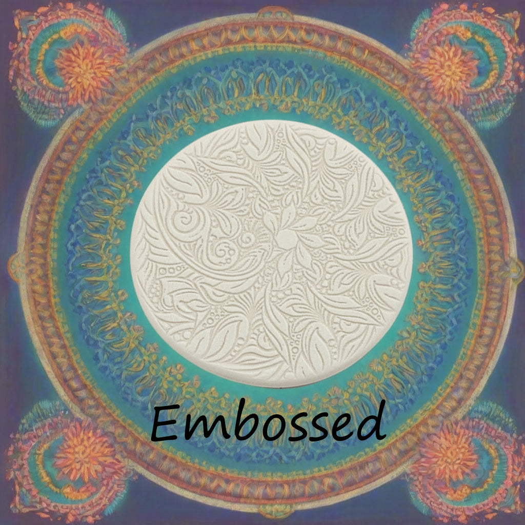 A flowery design debossed in silly putty using a  embossed texture mat. This will give you an idea of what it will look like on metal clay or polymer clay.