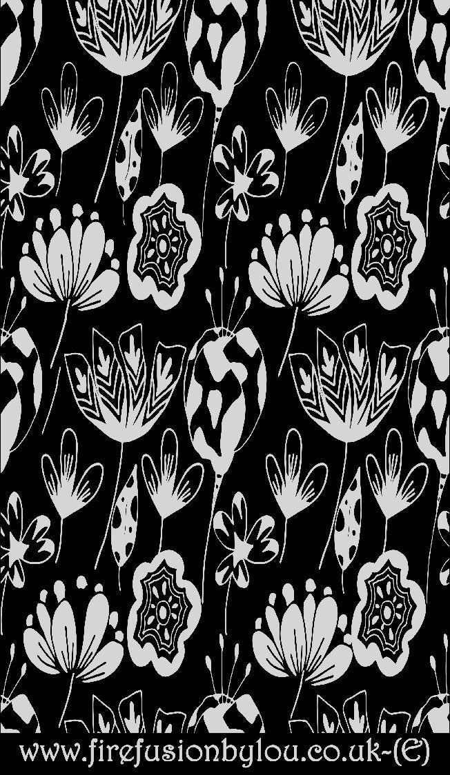 A debossed texture mat of flowers. This picture shows the texture mat pattern in black and white for use on metal clay or polymer clay.