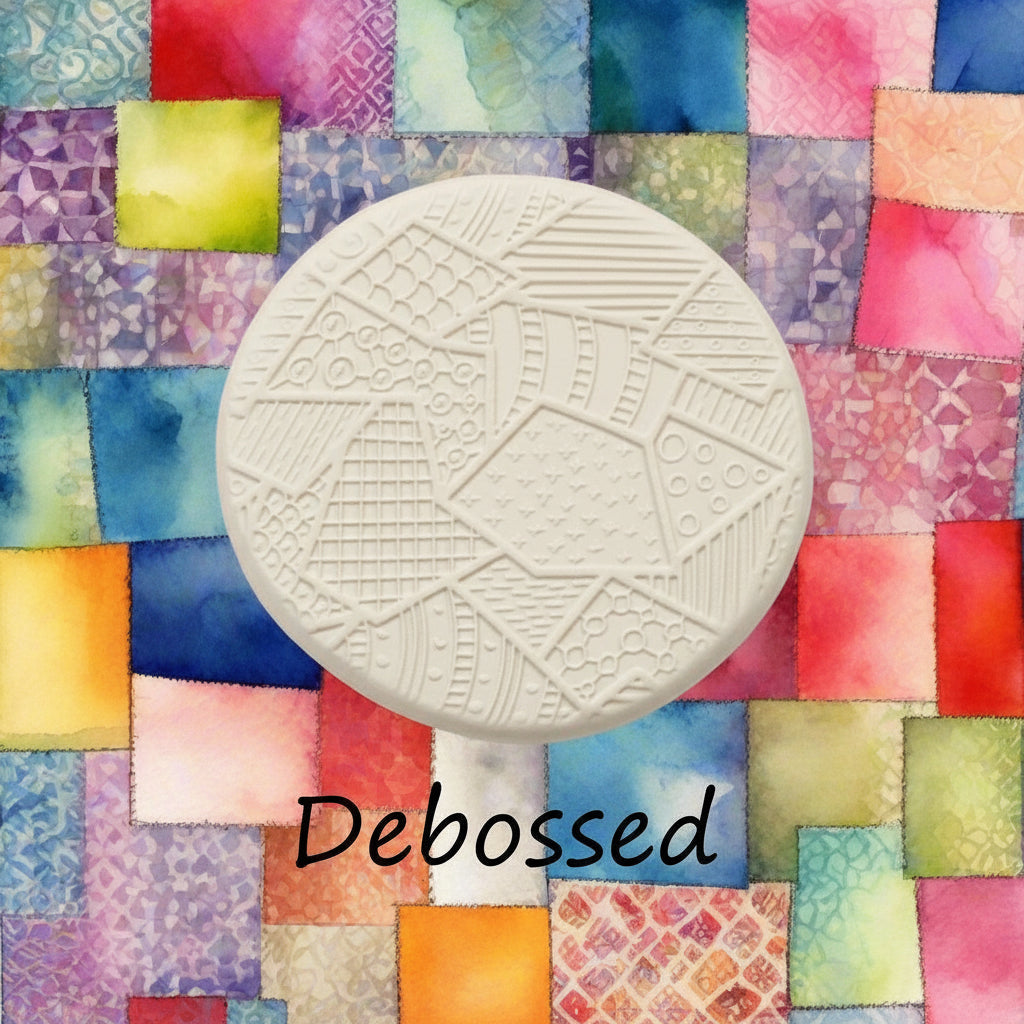 A pattern embossed in clay using a patterned debossed texture mat.