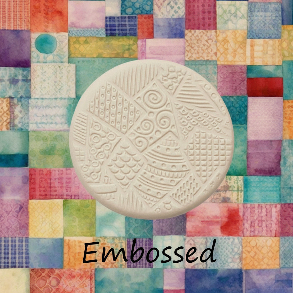 A pattern debossed in clay using a patterned embossed texture mat.
