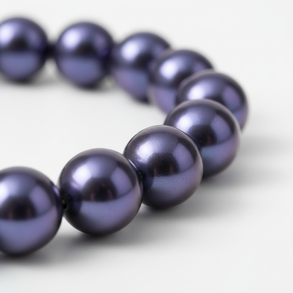"Close up of purple metallic glass beads 12mm showing lustrous metallic finish and vibrant colour"