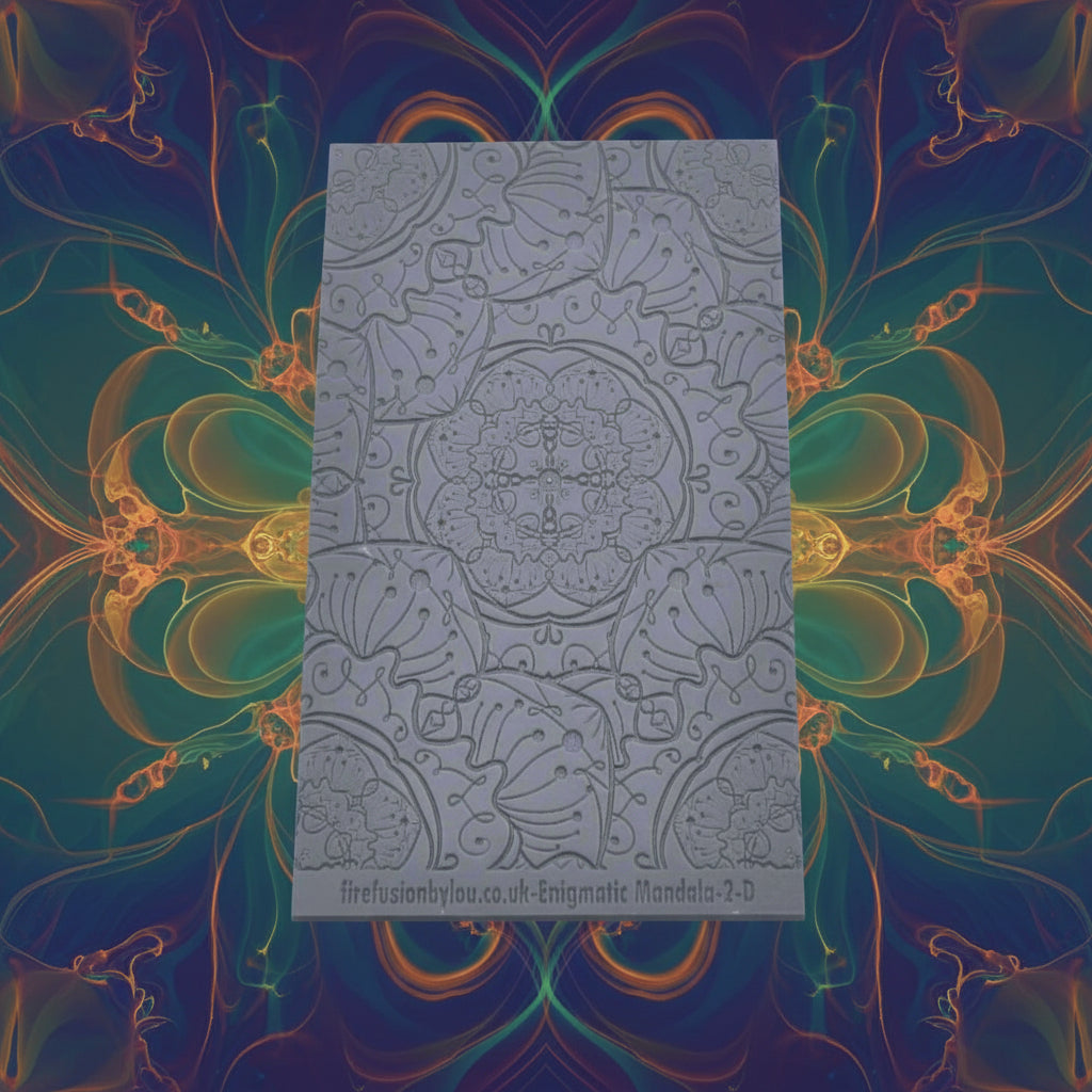 A debossed texture mat with a flowery mandala design. Use to make an impression on metal clay and polymer clay.