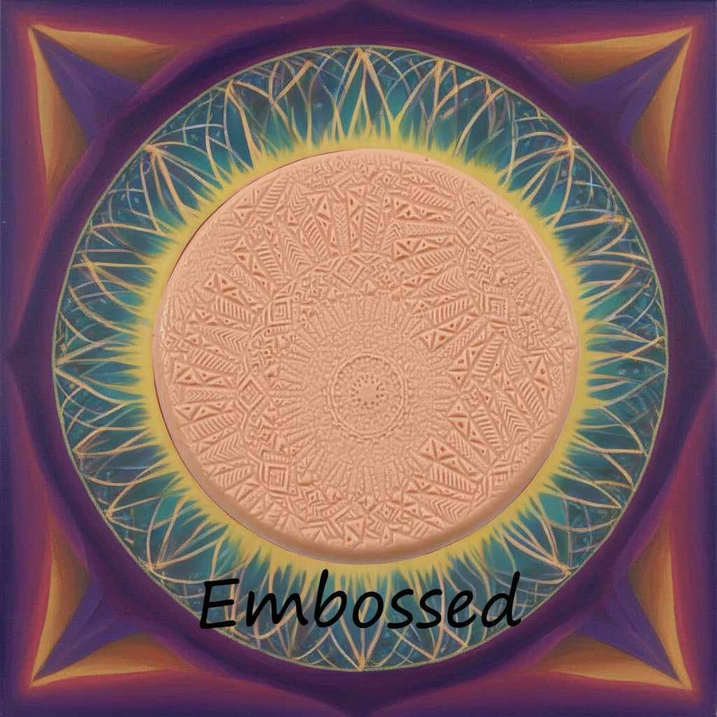 An array of flowery mandala patterned petals debossed in silly putty Using a embossed texture mat in grey material. This will give you an idea of what it will look like on metal clay or polymer clay.