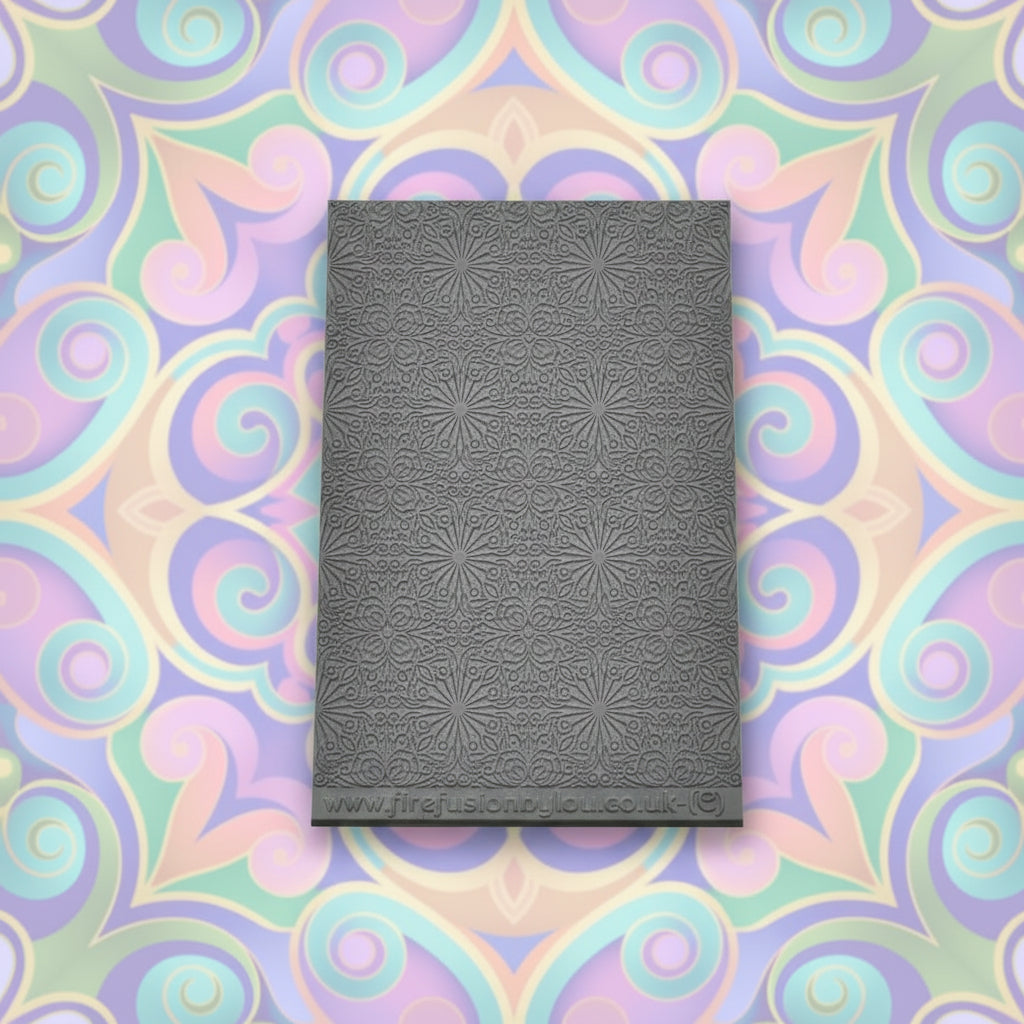 fancy geometric embossed texture mat in grey material. The texture mat pattern will give a debossed effect on metal clay or polymer clay.