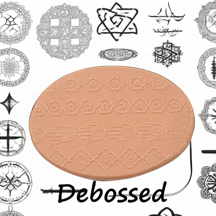 A pattern embossed in silly putty Using a patterned debossed texture mat in grey material. This will give you an idea of what it will look like on metal clay or polymer clay.
