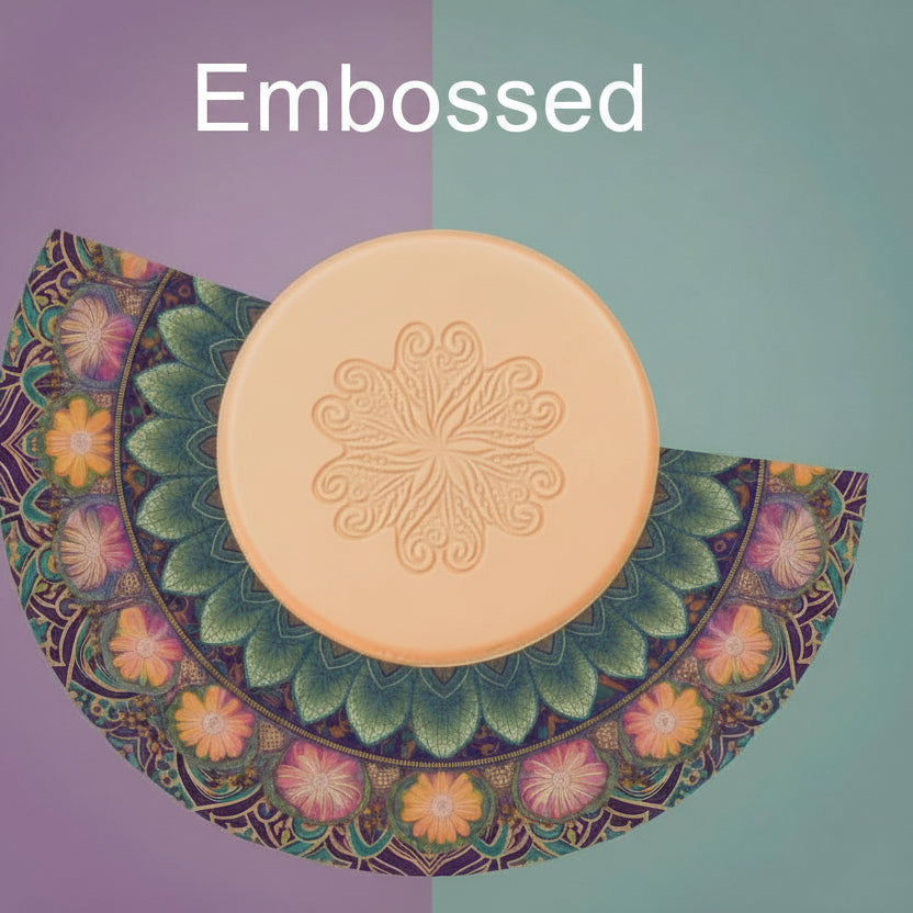 A flower mandala debossed in silly putty Using a embossed texture mat. This will give you an idea of what it will look like on metal clay or polymer clay.