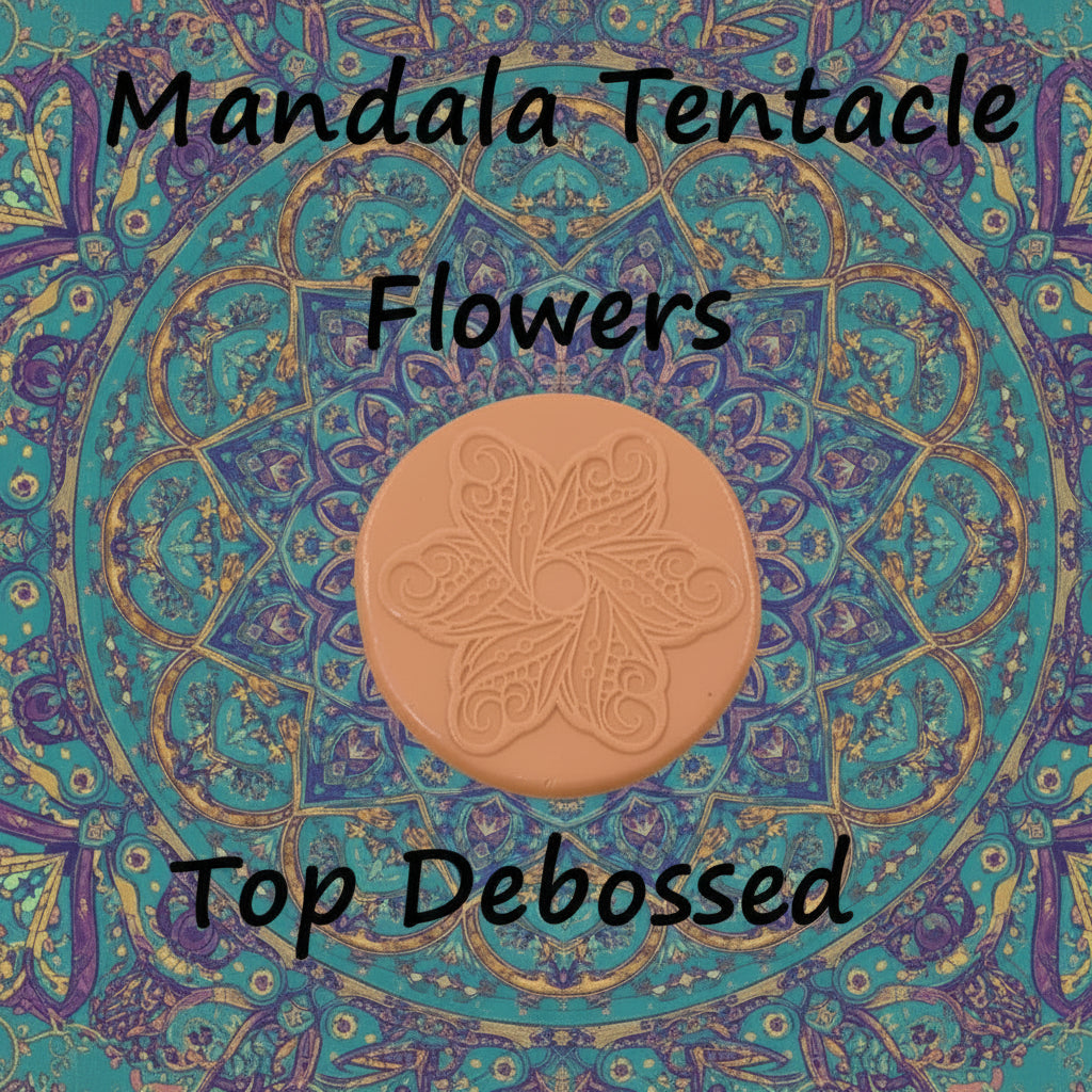 A flower mandala embossed in silly putty Using a debossed texture mat. This will give you an idea of what it will look like on metal clay or polymer clay.