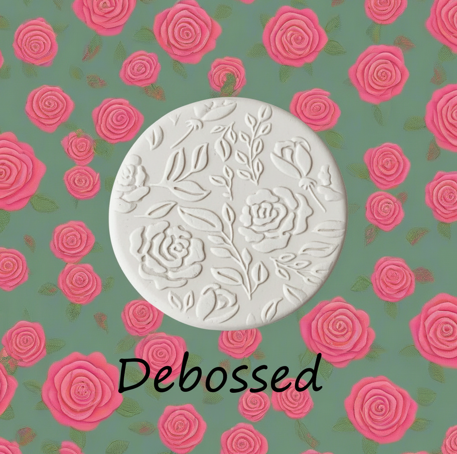 Retro Roses embossed in clay Using a  debossed texture mat. 