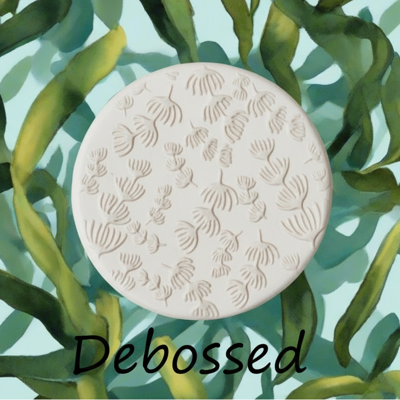 Sea Kelp embossed in clay Using a  debossed texture mat. 