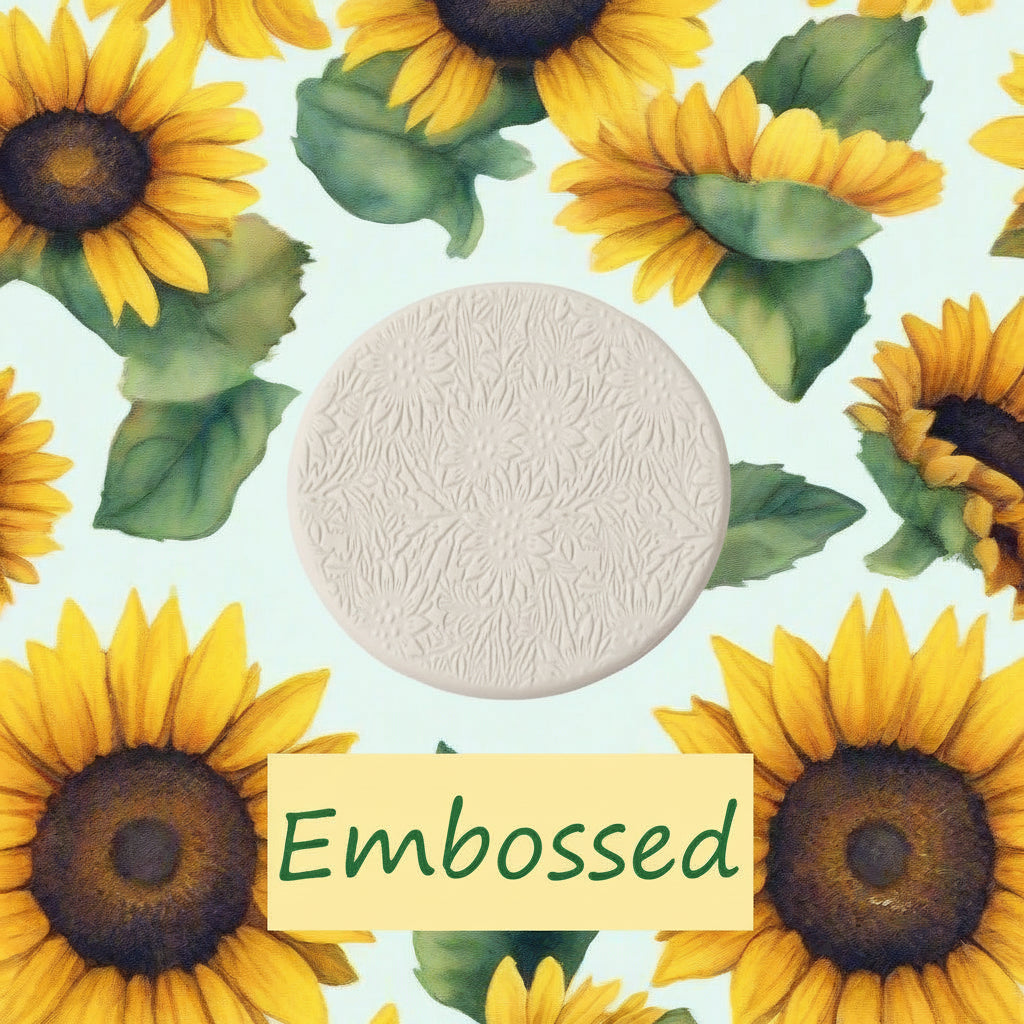 A small sunflower pattern debossed in clay using a small sunflower patterned embossed texture mat.