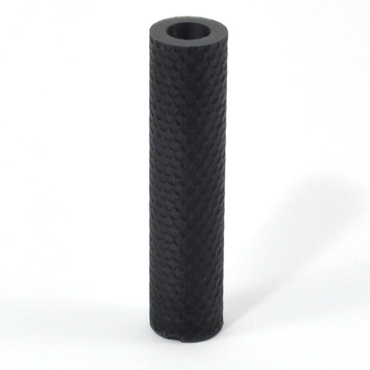 Black textured cylindrical object on a white background