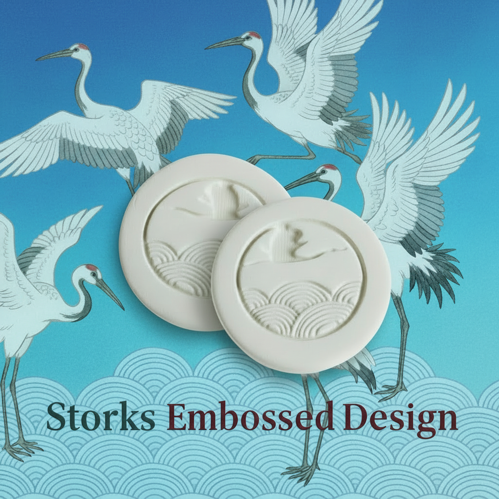 Embossed design of storks on a light green background with 'Storks Embossed Design' text.