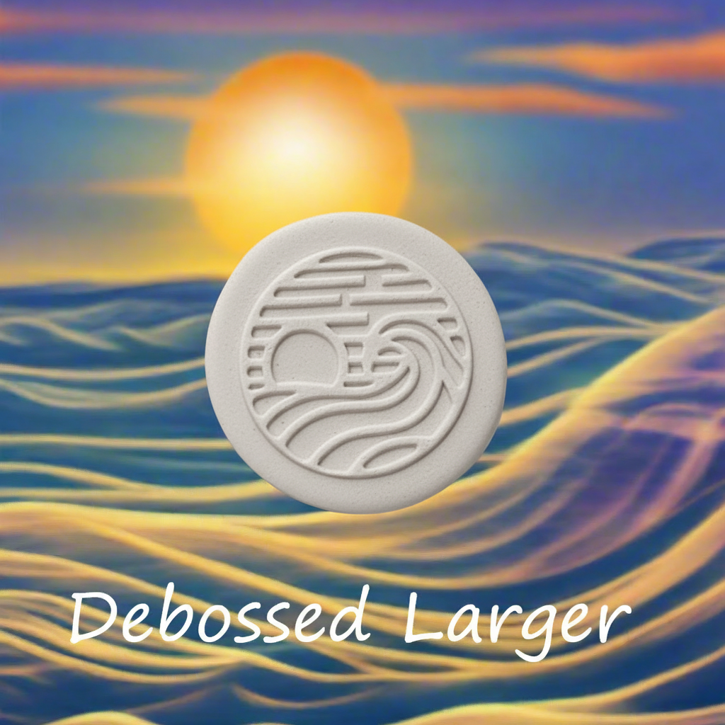 "Sun and waves Debossed impressions in clay showing sunken texture patterns"