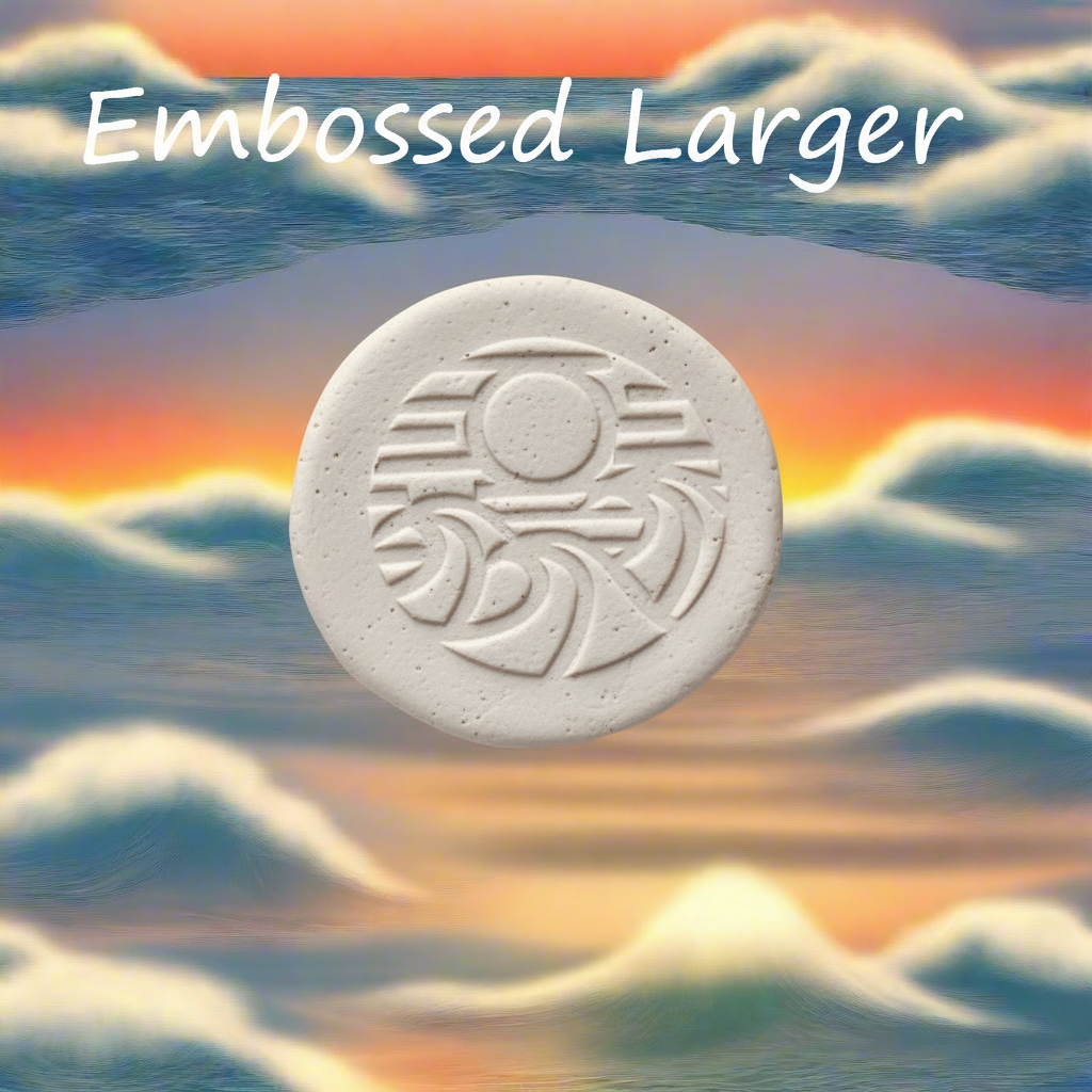 "Sun and waves Embossed impressions in clay showing raised texture patterns"