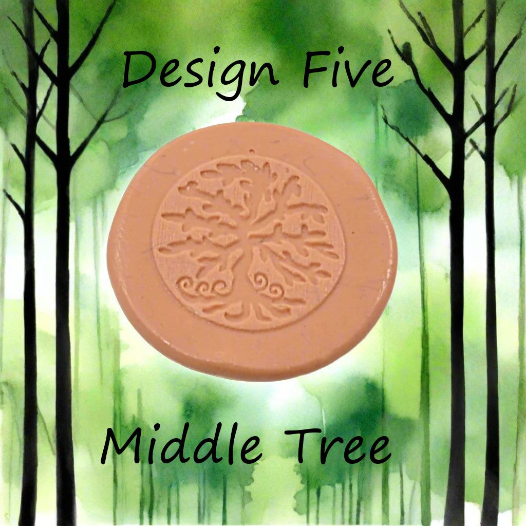 A tree debossed in silly putty Using a  embossed texture mat. This will give you an idea of what it will look like on metal clay or polymer clay