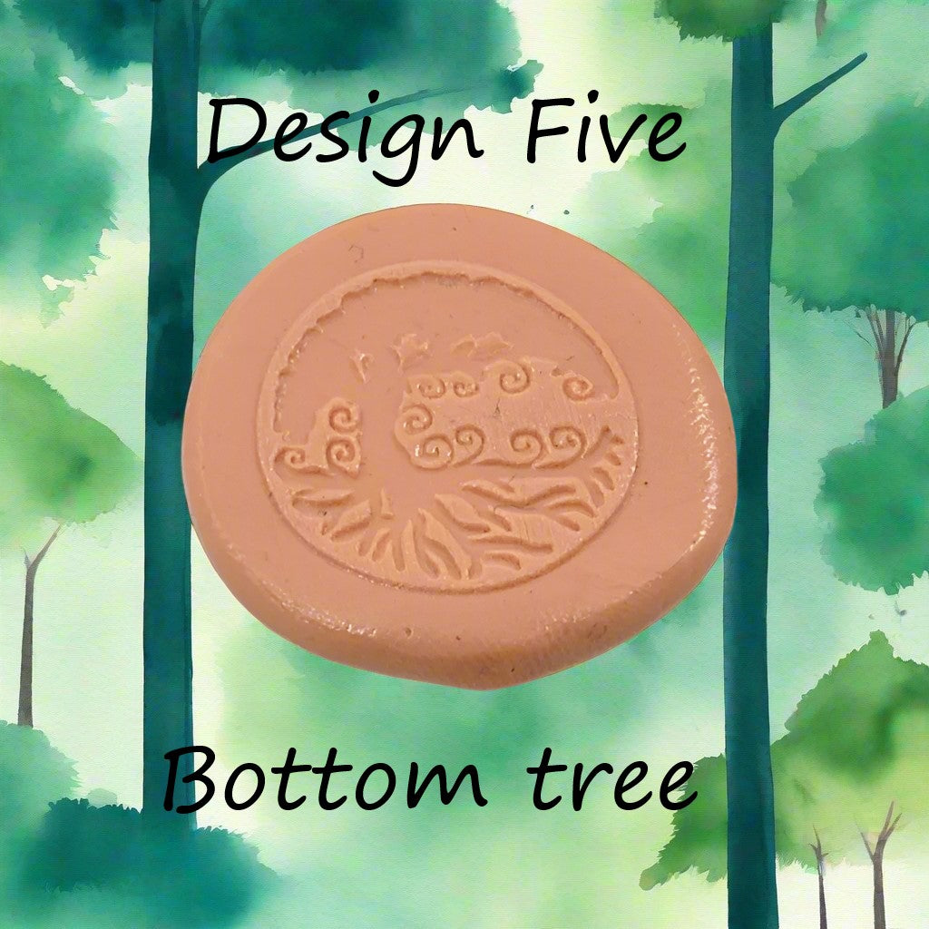 A tree debossed in silly putty Using a  embossed texture mat. This will give you an idea of what it will look like on metal clay or polymer clay