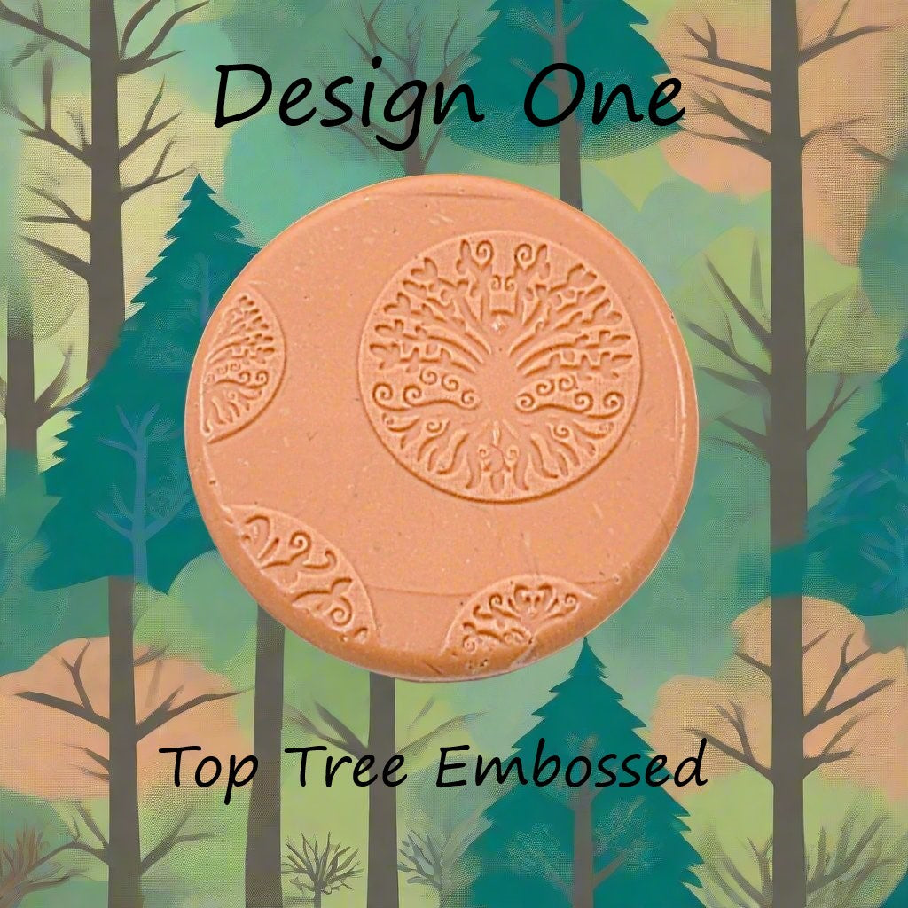 A tree debossed in silly putty Using a  embossed texture mat. This will give you an idea of what it will look like on metal clay or polymer clay