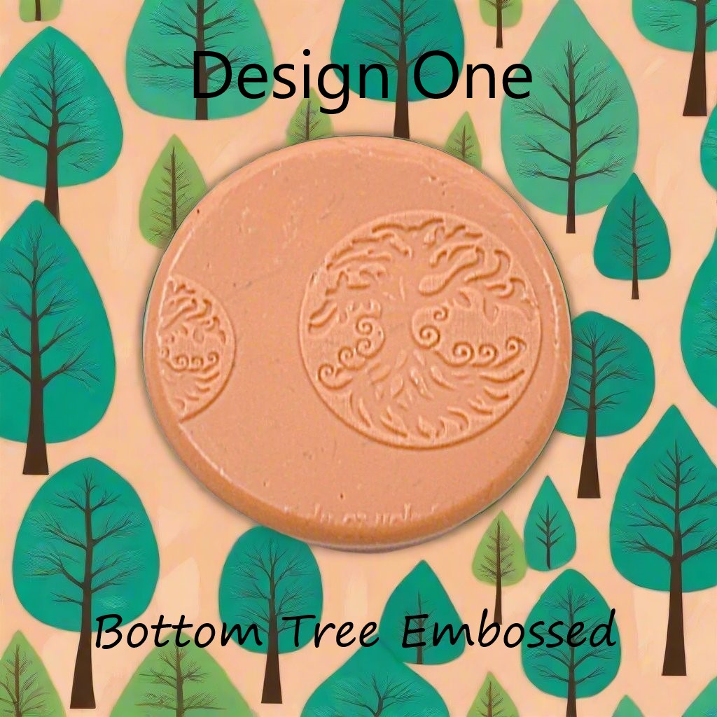 A tree debossed in silly putty Using a  embossed texture mat. This will give you an idea of what it will look like on metal clay or polymer clay