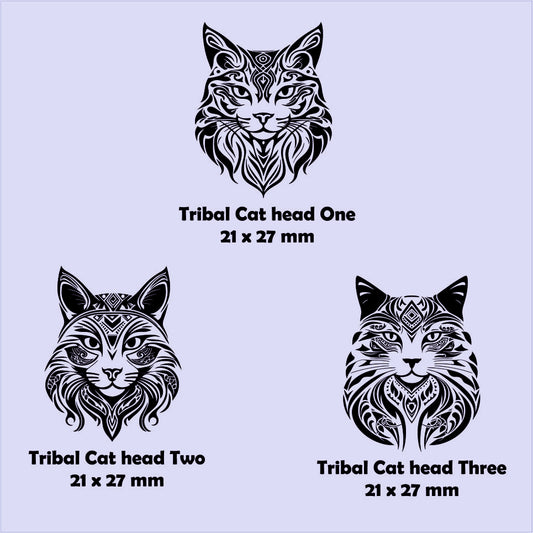 Three tribal cat head designs with dimensions on a light blue background