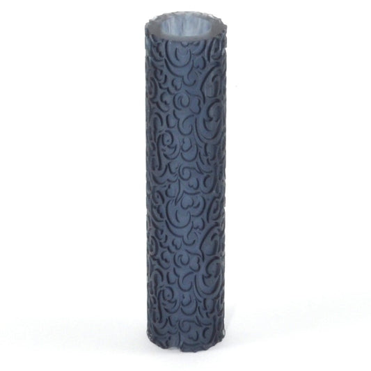 Dark gray cylindrical object with embossed pattern on a white background
