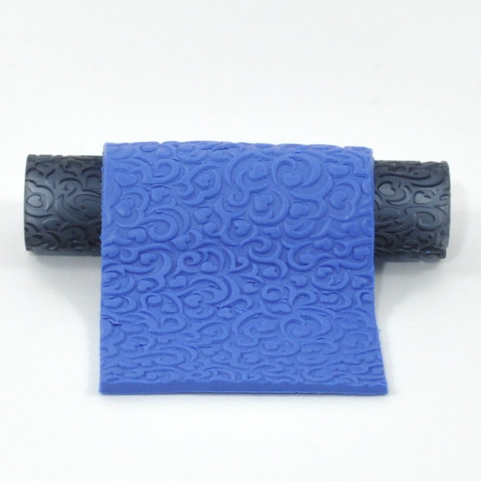 Blue textured roller on a white background