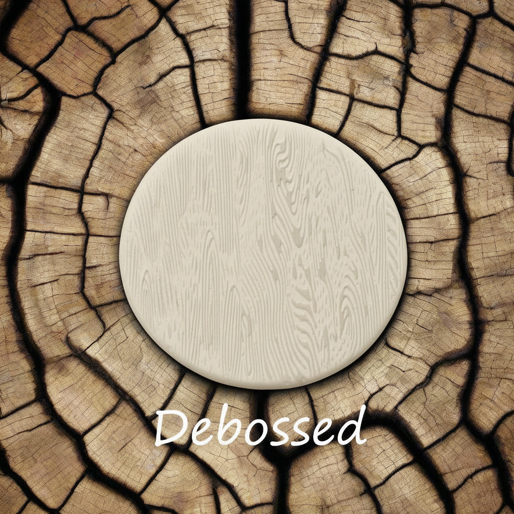 Tree bark designs embossed in clay Using a  debossed texture mat. This will give you an idea of what it will look like on metal clay or polymer clay.