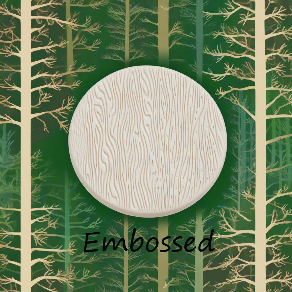 Tree bark designs debossed in clay Using a embossed texture mat. This will give you an idea of what it will look like on metal clay or polymer clay.