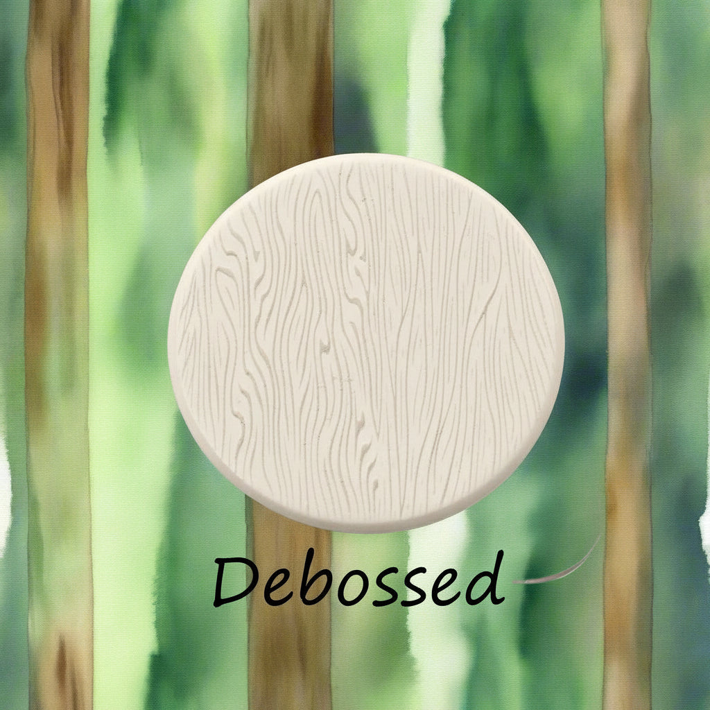 Tree bark designs embossed in clay Using a  debossed texture mat. This will give you an idea of what it will look like on metal clay or polymer clay.