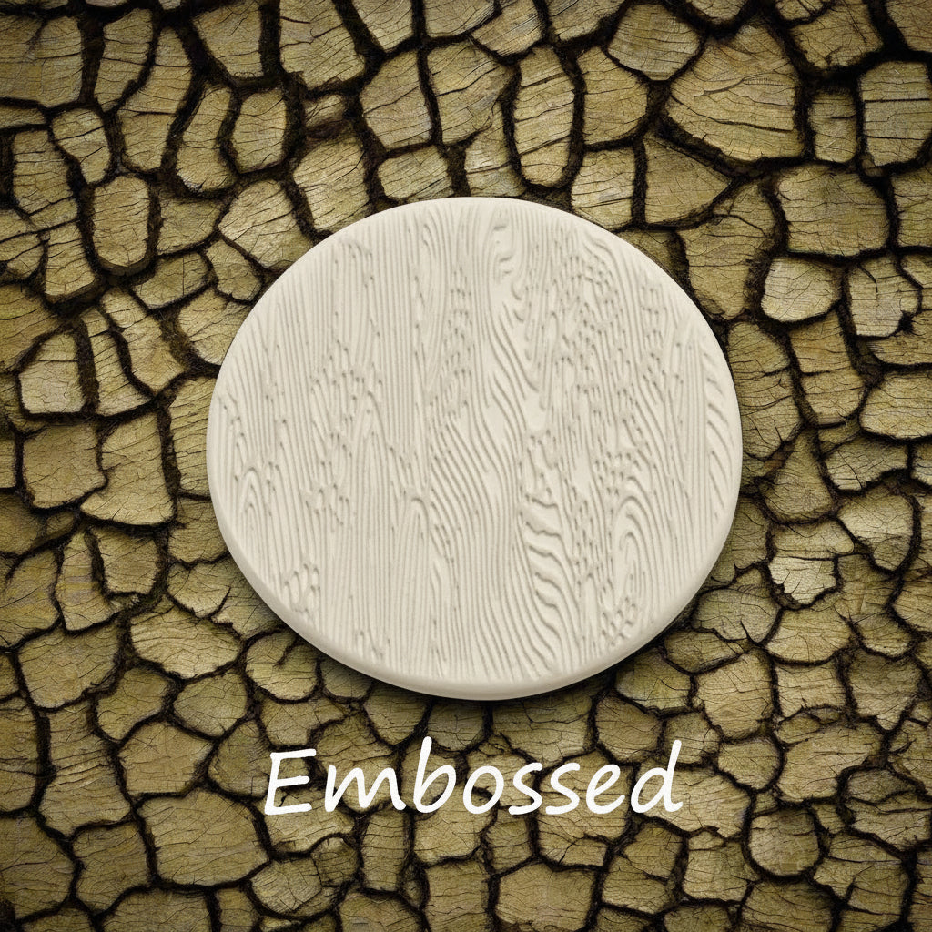 Tree bark designs debossed in clay Using a embossed texture mat. This will give you an idea of what it will look like on metal clay or polymer clay.