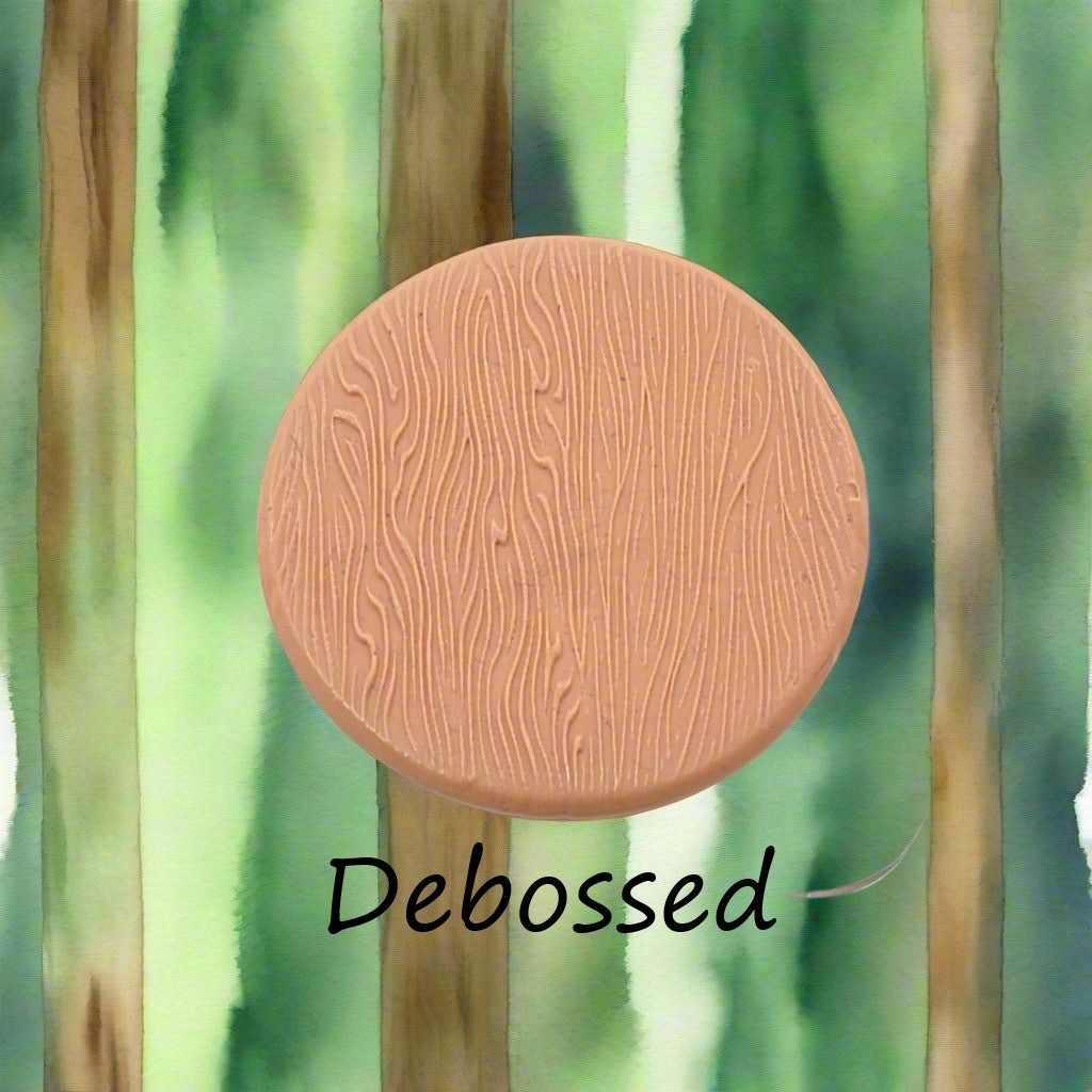 Tree bark designs embossed in silly putty Using a  debossed texture mat. This will give you an idea of what it will look like on metal clay or polymer clay.