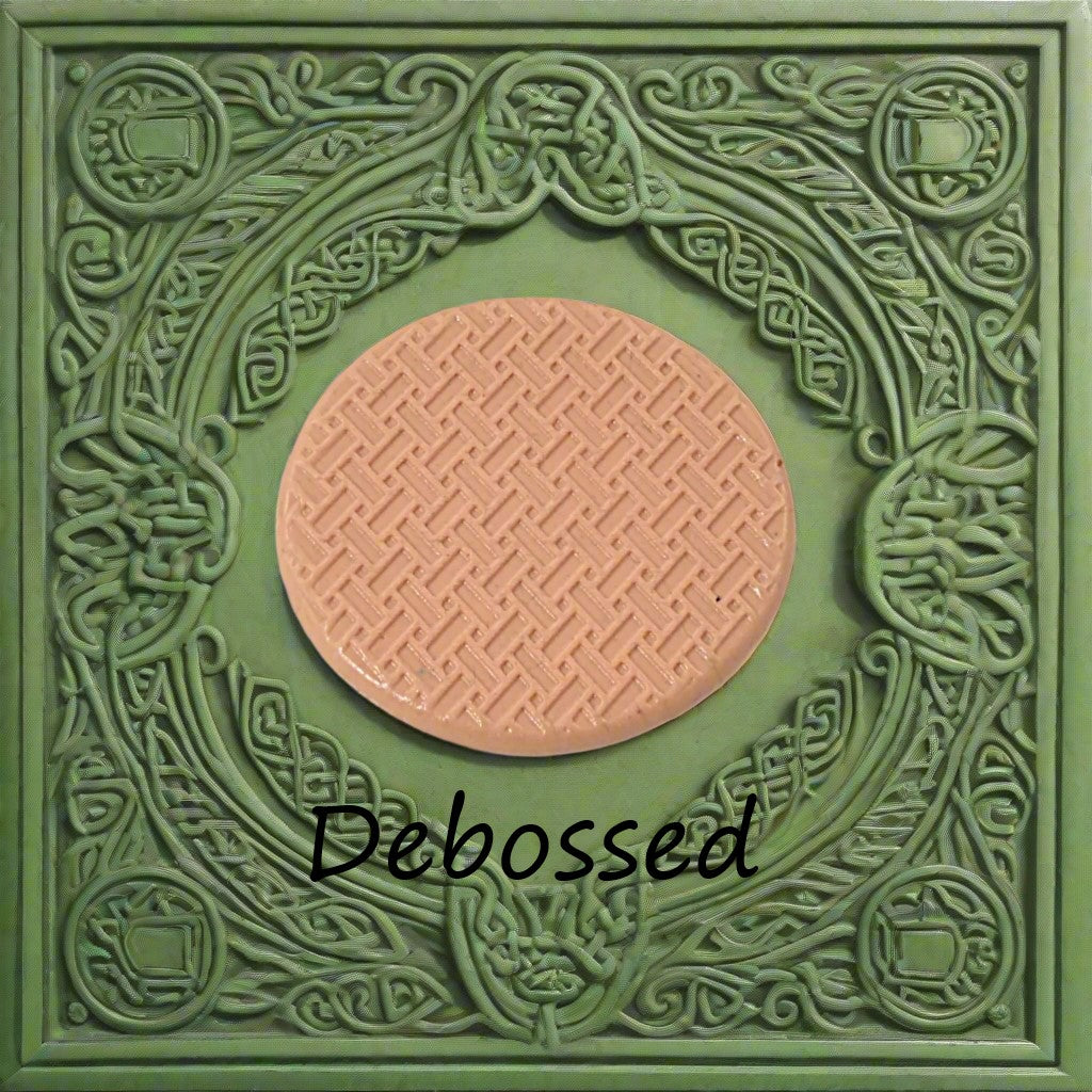 Celtic design embossed in silly putty Using a  debossed texture mat. This will give you an idea of what it will look like on metal clay or polymer clay