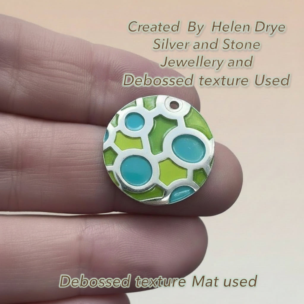 conjoined-circles-pendant with enamel in green and turquoise made by Helen_Drye-of Silver and Stone Jewellery