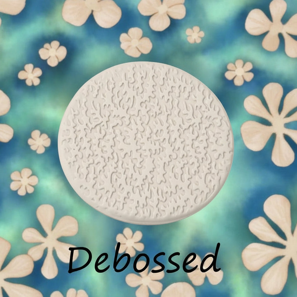 coral embossed in clay using a  debossed texture mat. 