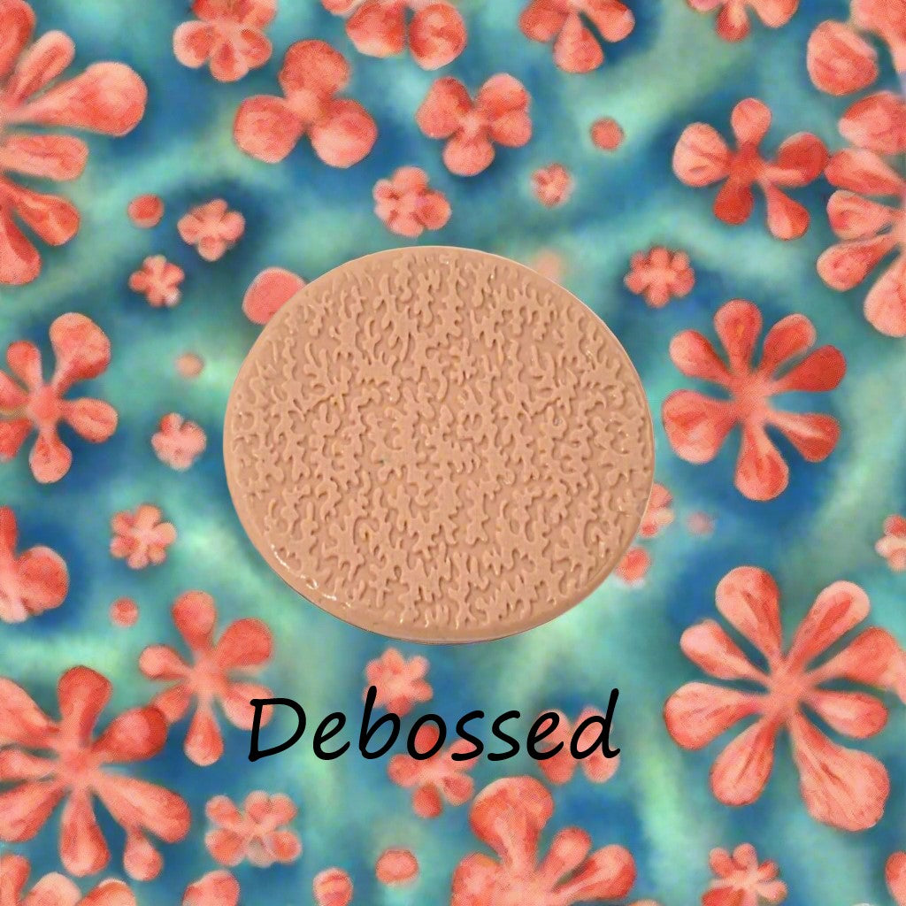 coral embossed in silly putty Using a  debossed texture mat. This will give you an idea of what it will look like on metal clay or polymer clay