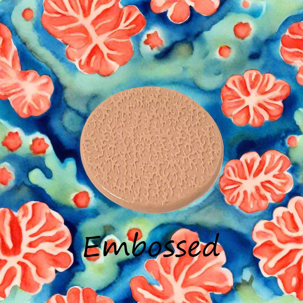 coral debossed in silly putty Using a  embossed texture mat. This will give you an idea of what it will look like on metal clay or polymer clay