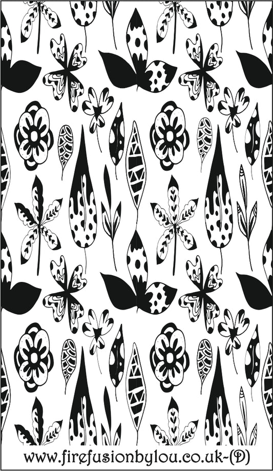 A debossed texture mat of flowers. This picture shows the texture mat pattern in black and white for use on metal clay or polymer clay.