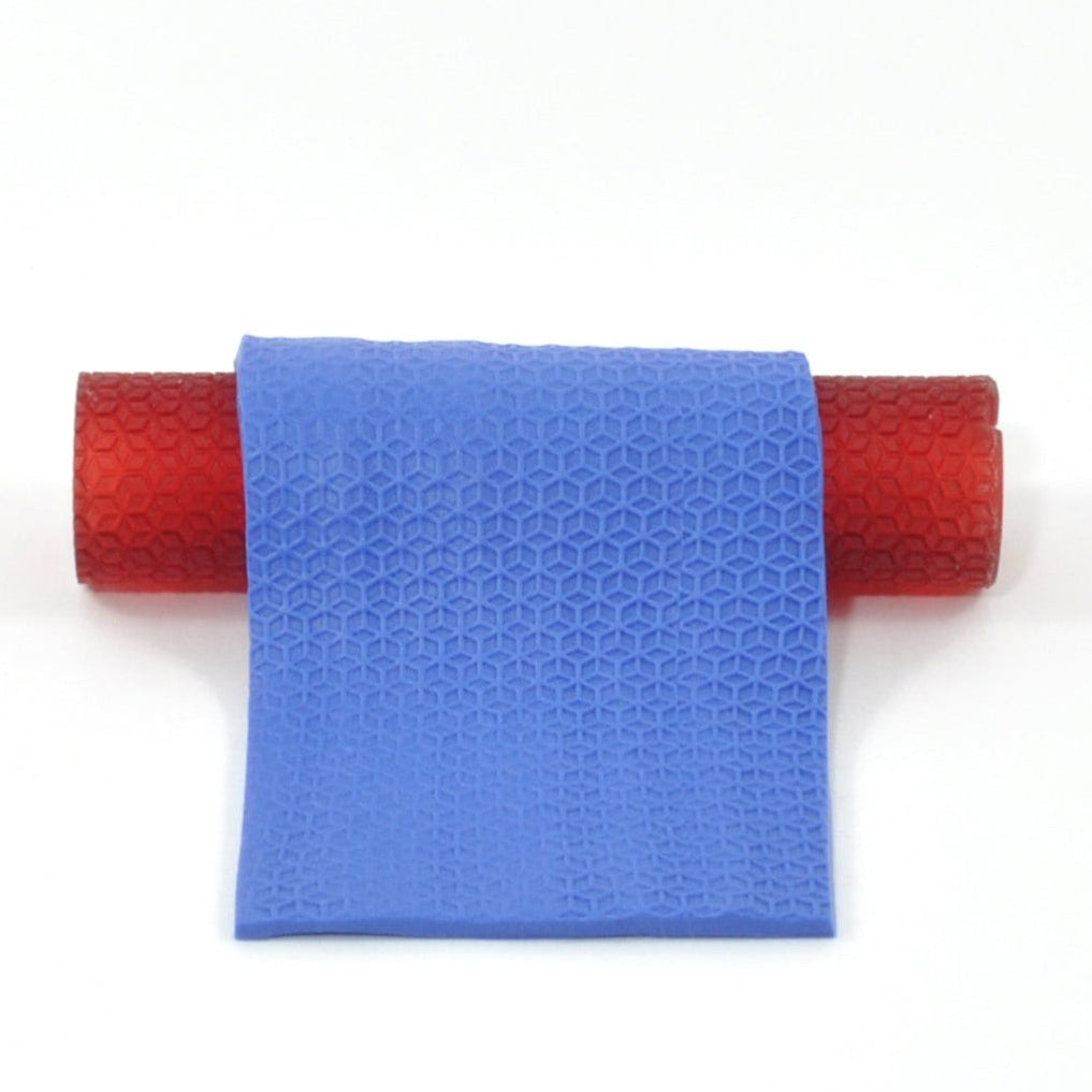 Blue textured mat with red roller on a white background