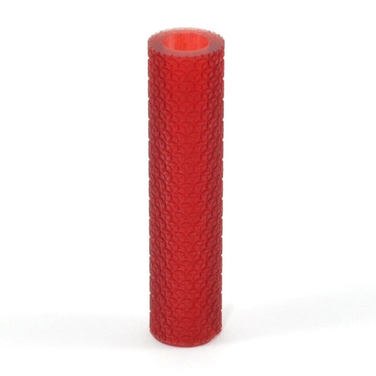 Red textured cylindrical object on a white background