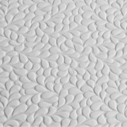 Textured white clay drops pattern