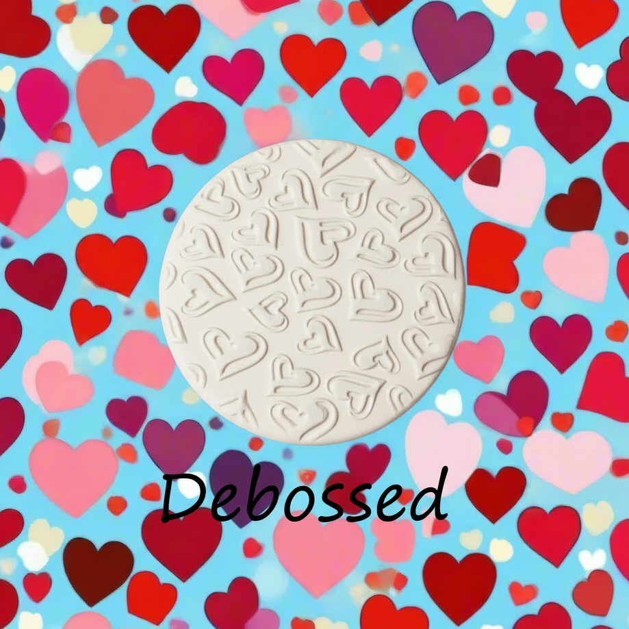 Confetti Hearts embossed in clay. This will give you an idea of what it will look like on metal clay or polymer clay