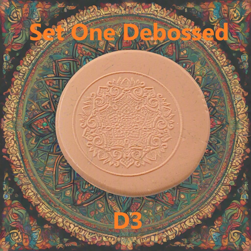 A mandala pattern embossed in silly putty using an debossed texture mat. This will give you an idea of what it will look like on metal clay or polymer clay.
