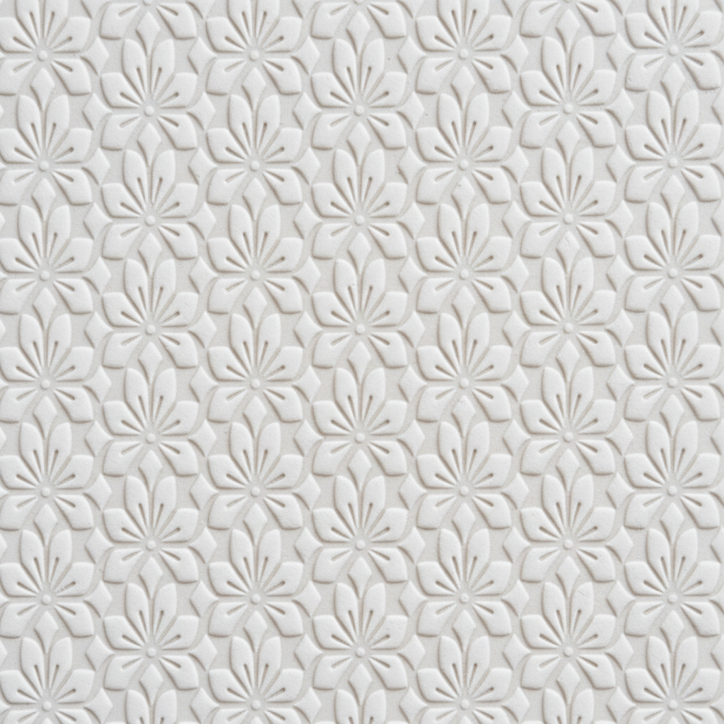 white clay embossed with a subtle floral pattern using a flowers texture roller.