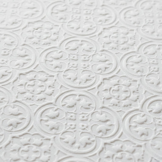 white textured geometric pattern using a geometric texture roller.