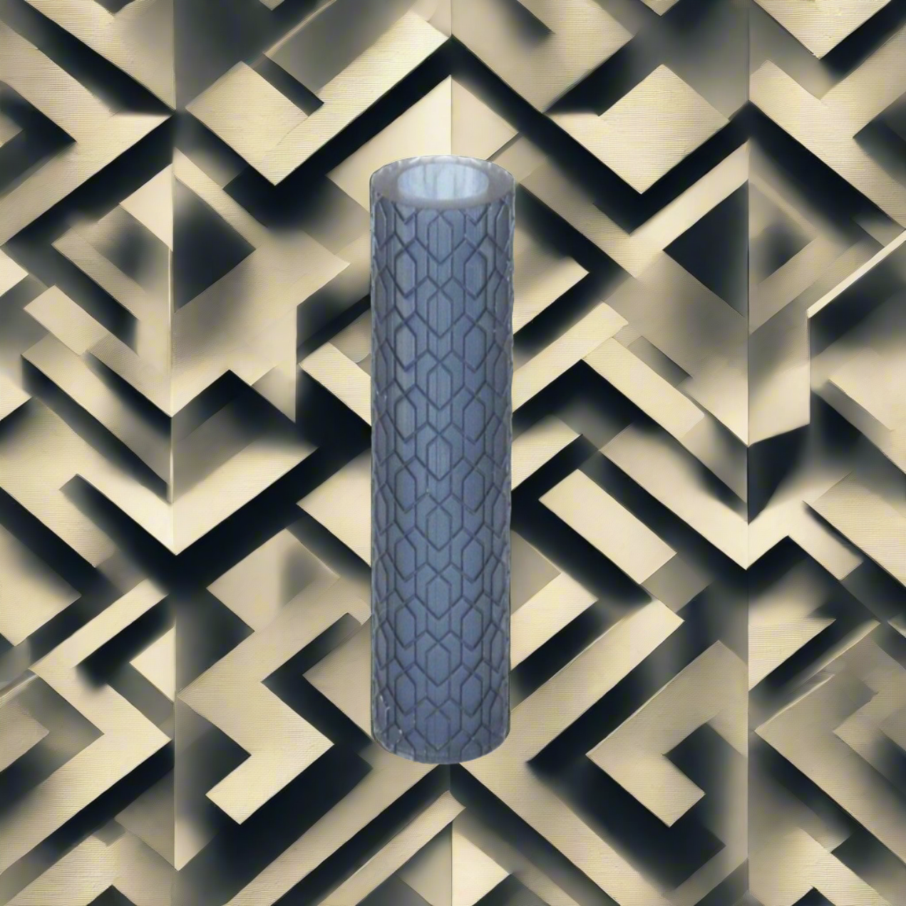 A cylindrical textured roller for metal clay or polymer clay, with a geometric floral repeat design, displayed against a geometric patterned background.