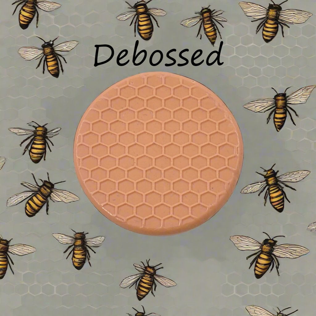 honey comb design embossed in silly putty Using a  debossed texture mat. This will give you an idea of what it will look like on metal clay or polymer clay