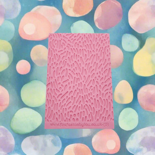 A Jelly bean pattern debossed texture mat.