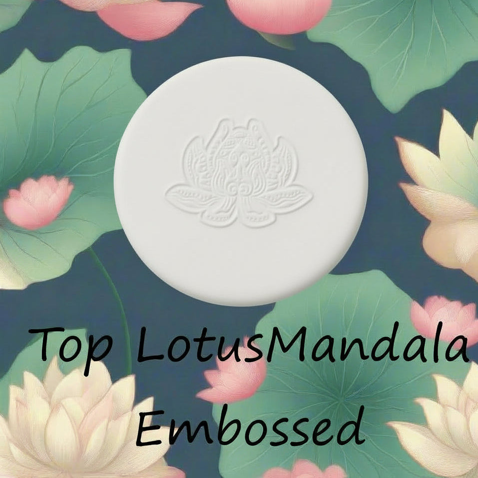 A lotus flower mandala debossed in clay using a embossed texture mat.