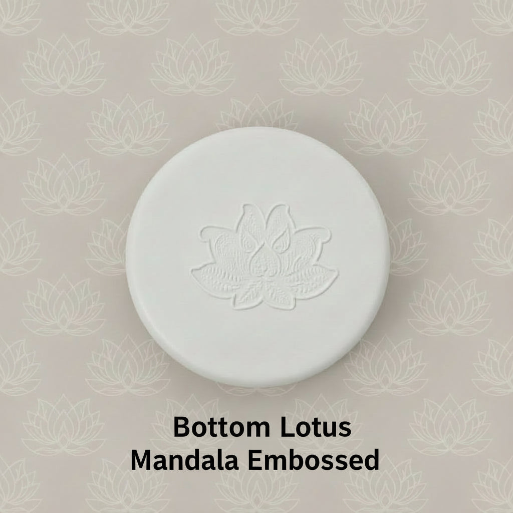 A lotus flower mandala debossed in clay using a embossed texture mat.