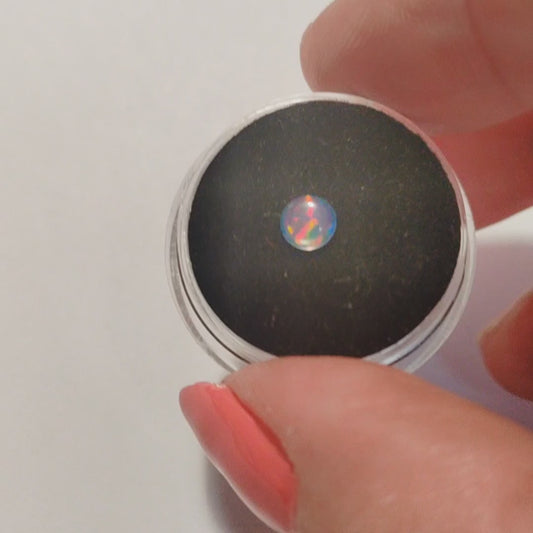 Translucent Blue fireable opal with red flashes